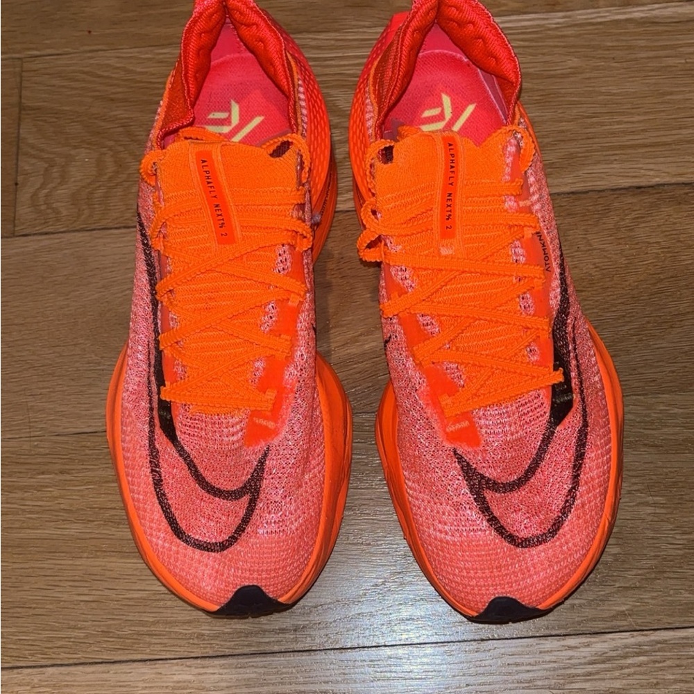 Nike Women's Shoes in Bright Orange and Black